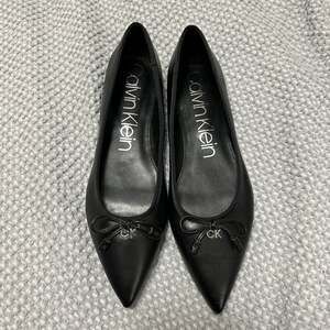 Calvin Klein Kirra 2 Black Leather Pointed-Toe Ballet Flats with Bow